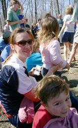 A family sits to enjoy the awarding of Billygoat t-shirts.