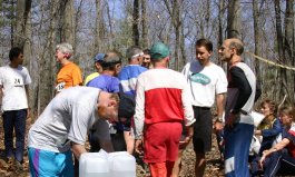 orienteers conversing near the refreshment table